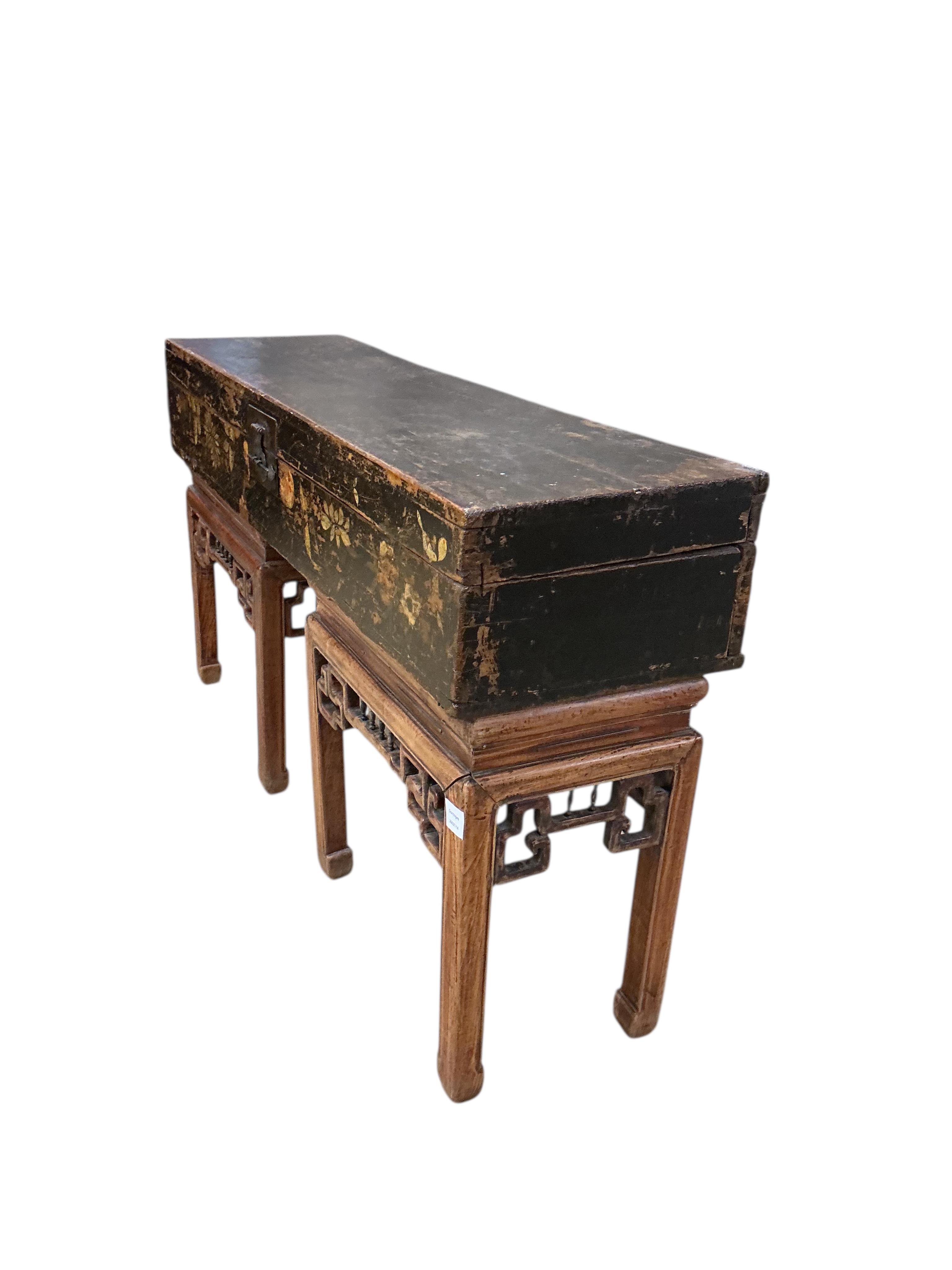 A Chinese painted box on associated rosewood stand, width 128cm, depth 35cm, height 72cm